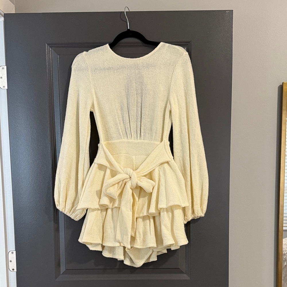 Elegant Long Sleeve Cream Romper with Bow Detail & Ruffles
